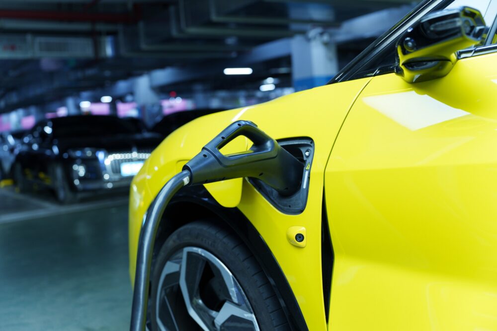 An electric car that is currently charging.|