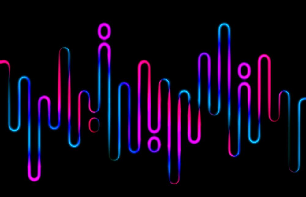 Glowing pink and blue neon lines resembling soundwaves or equalizer bars on a black background