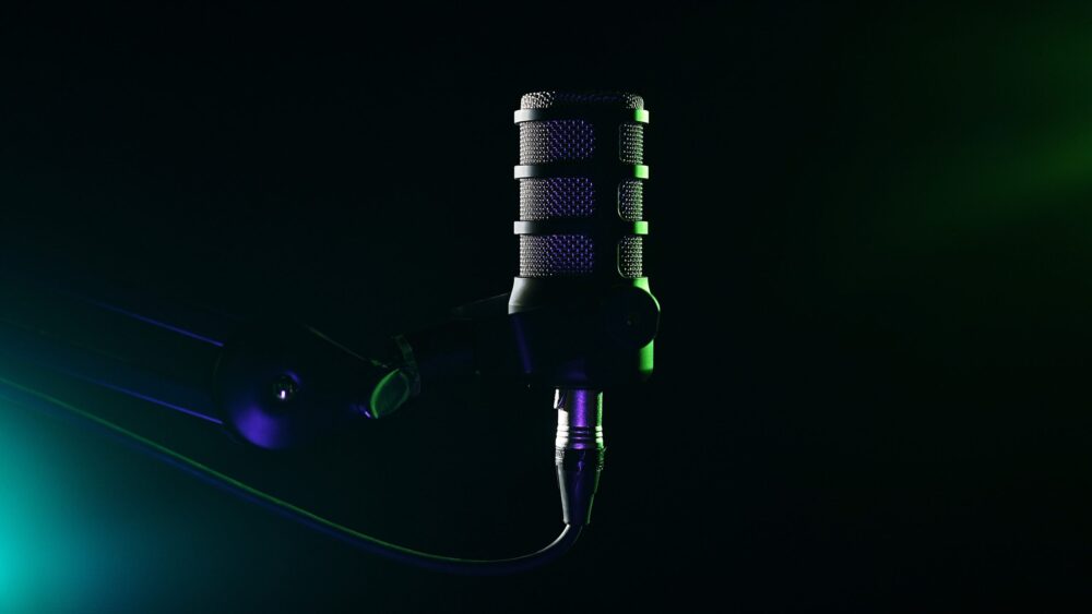 A dynamic studio microphone on a boom arm